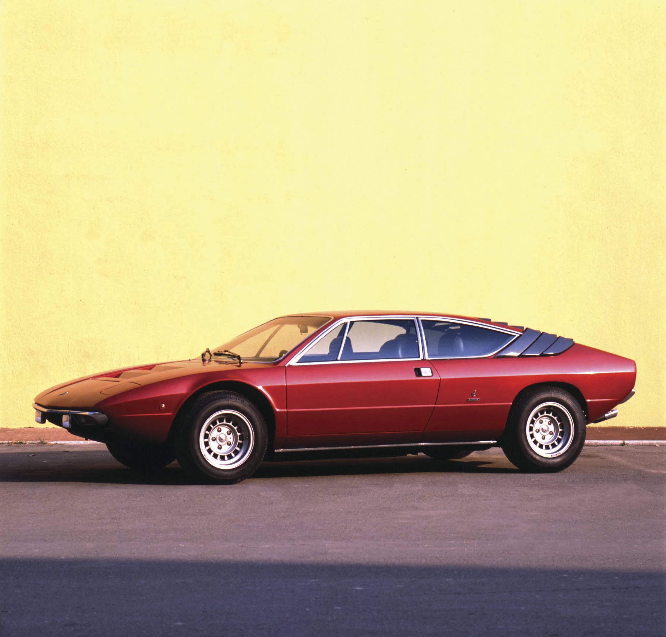 Carrying more than a little Espada in its design, the Urraco was better proportioned, with just a hint of De Tomaso in its lines