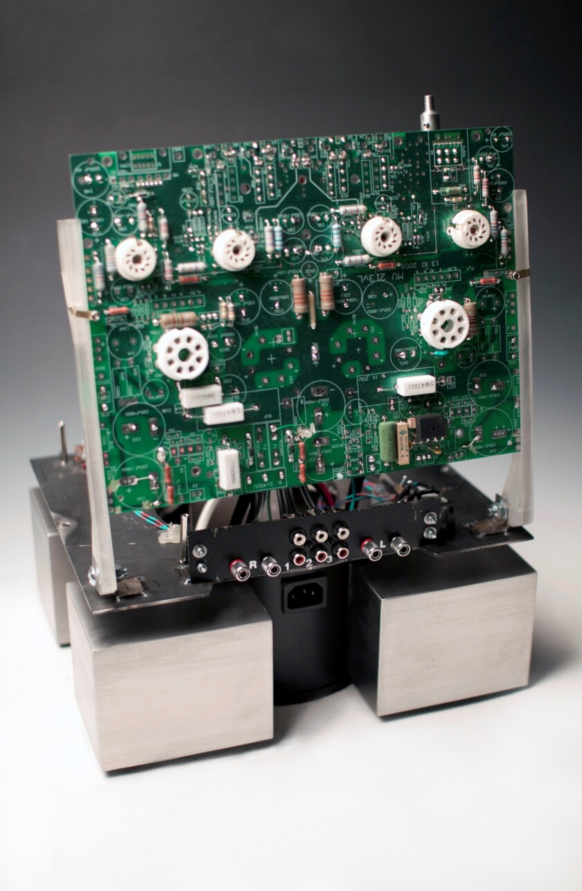The main sound board is attached to hinges so that it can be raised for dusting the electronics