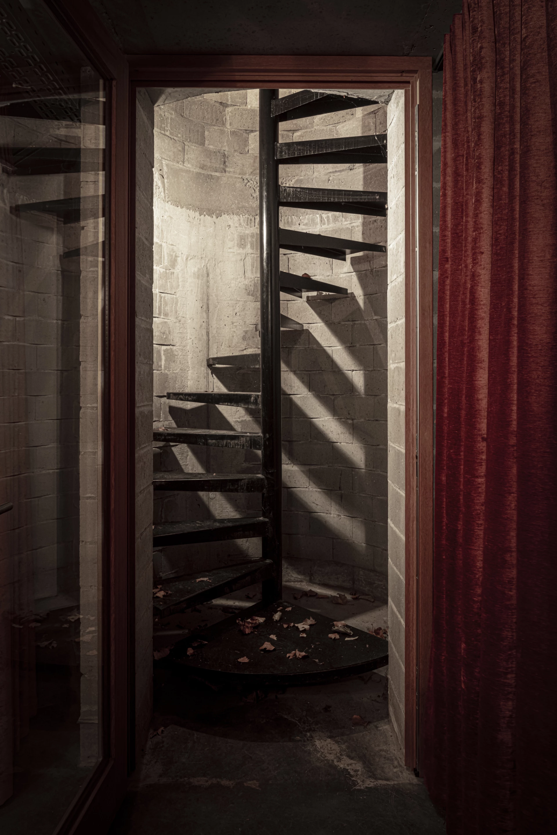 Alex Guesthouse's cinema is accessed by spiral staircase