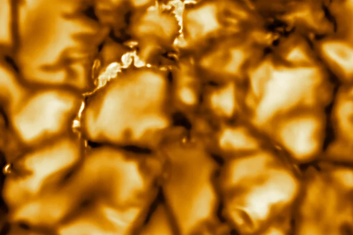 The boiling plasma surface of the sun at incredibly high resolution. Bright areas are plasma rising up to the surface, dark channels are cooling plasma heading back under, the bright areas in the dark channels represent powerful magnetic fields