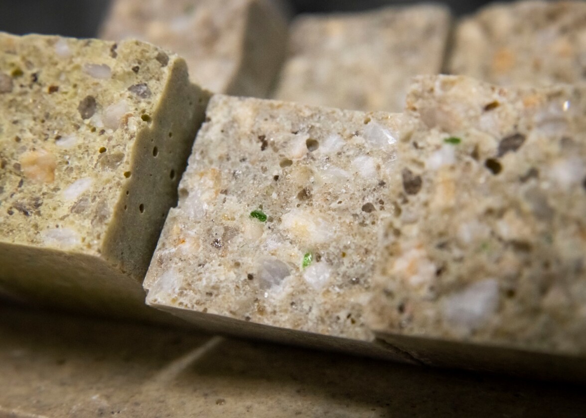 The glass-based polymer concrete was found to be significantly stronger than its traditional sand-based counterpart