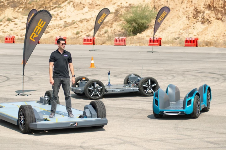 REE CEO and co-founder Daniel Barel rides the biggest skateboard (EV chassis) in town