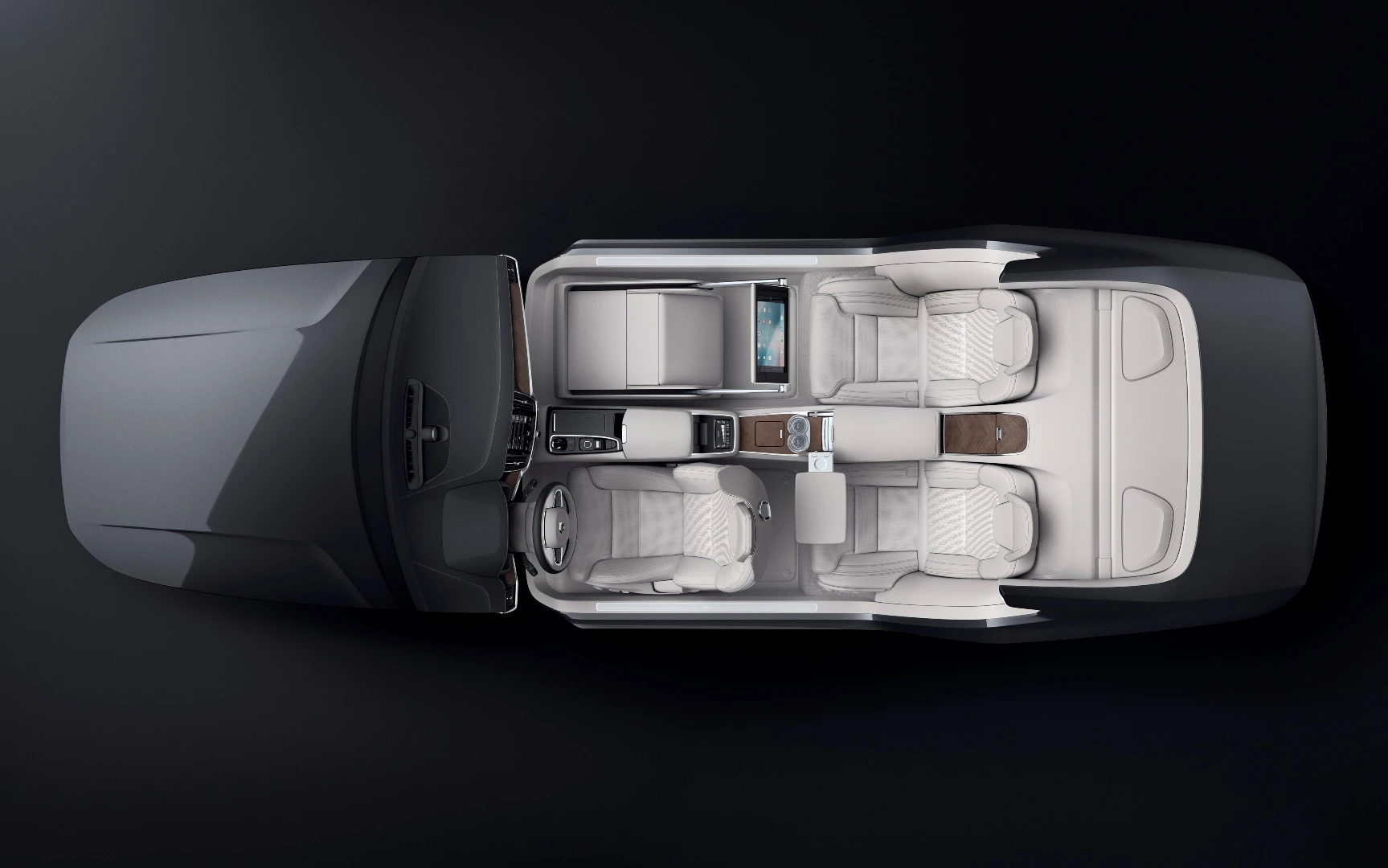 The rear center console houses all kinds of features, including a drink refrigerator and retractable touchscreen controller