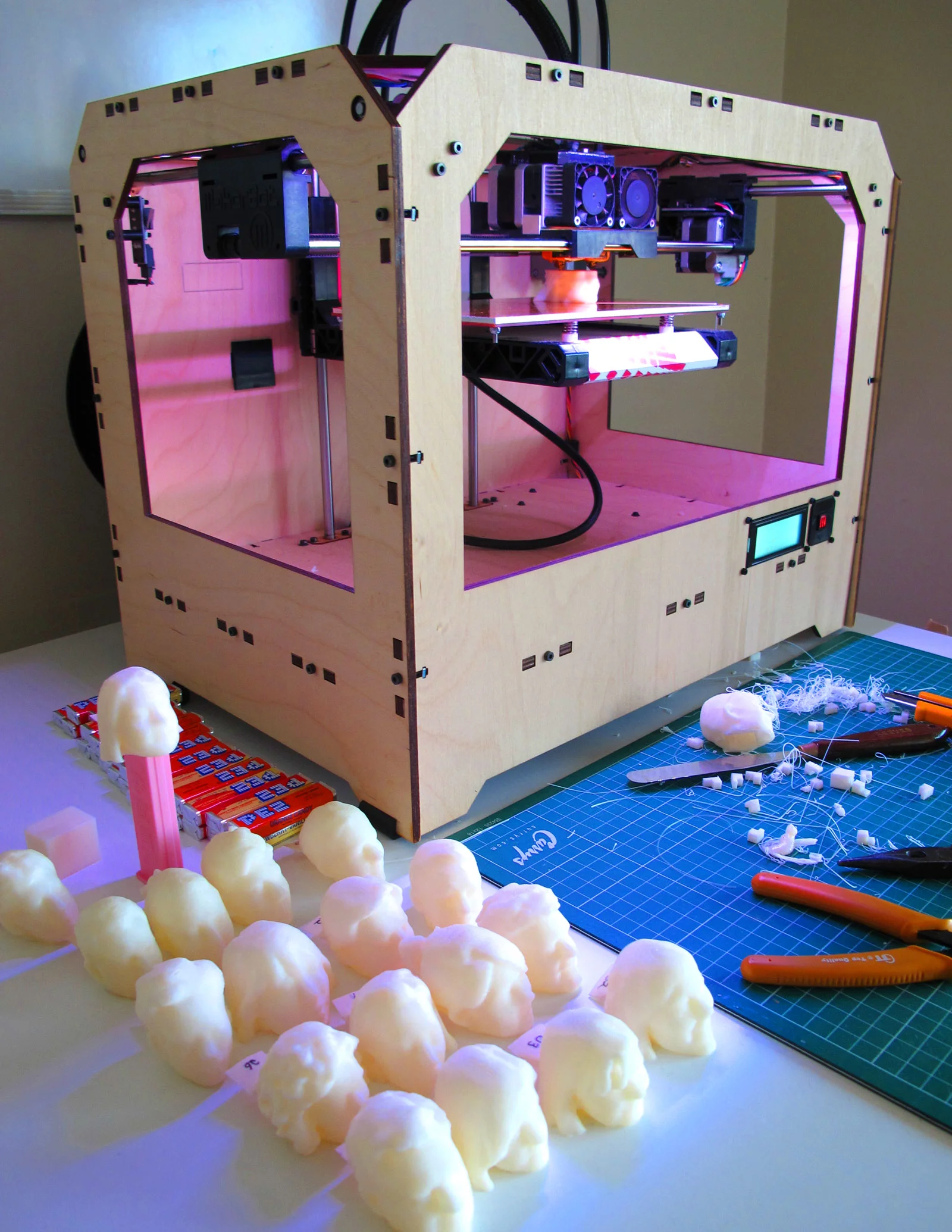 After creating the 3D models, it was just a matter of printing all 32 heads out with a Makerbot Replicator and attaching them to decapitated Pez dispensers