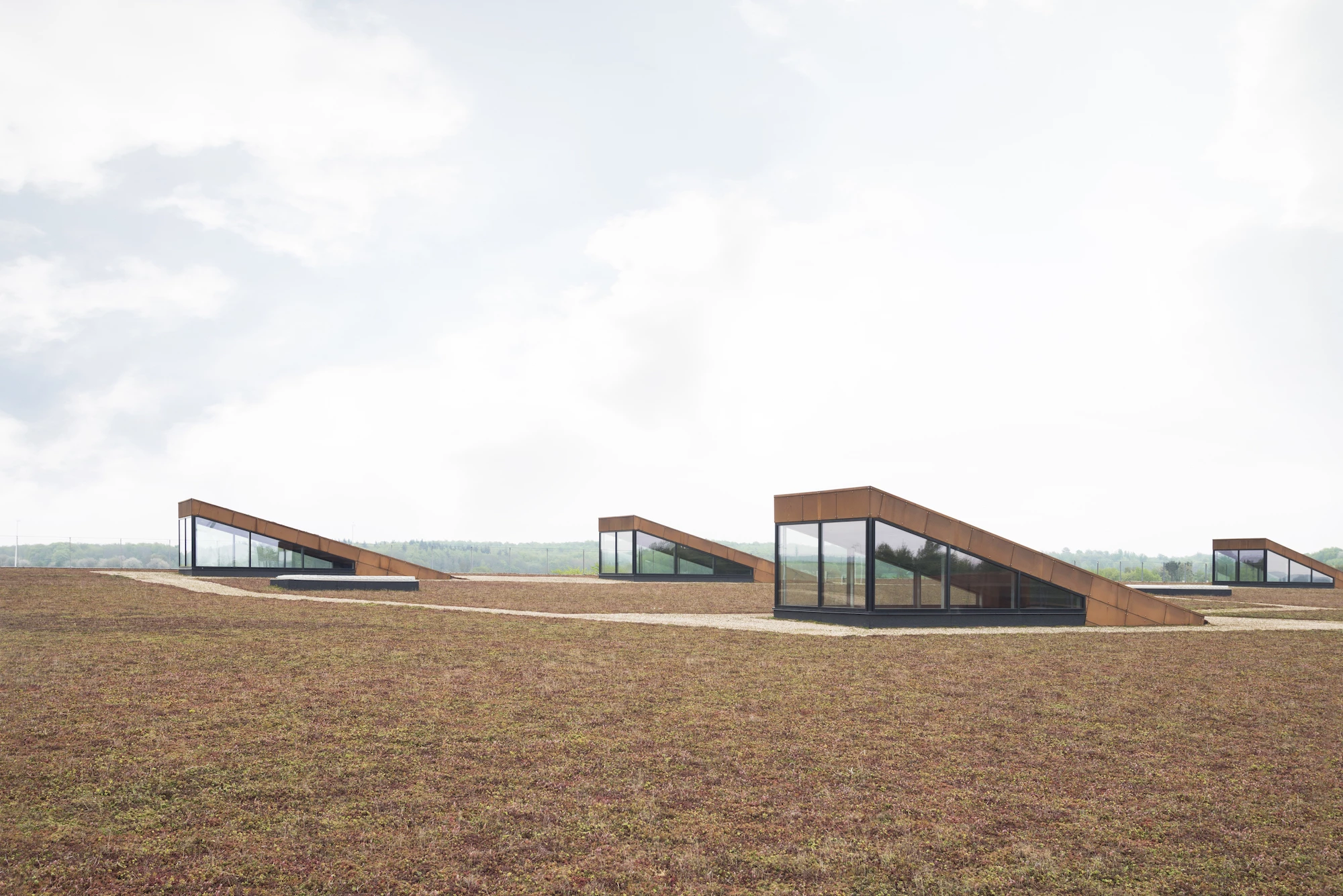 The Solrødgård Water Treatment Plant allows visitors to stroll through greenery and peer through the skylights to watch as the plant goes about its business
