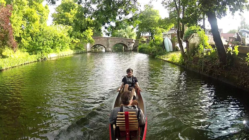 The Tandem canoe heading down the river
