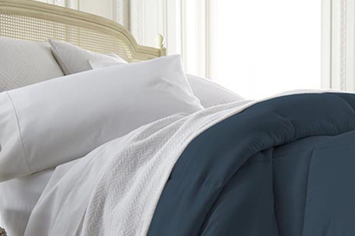 This cozy down alternative comforter is 100 hypoallergenic and