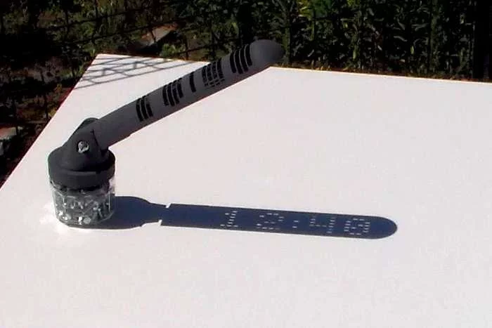 The digital sundial displays the current time within its own shadow