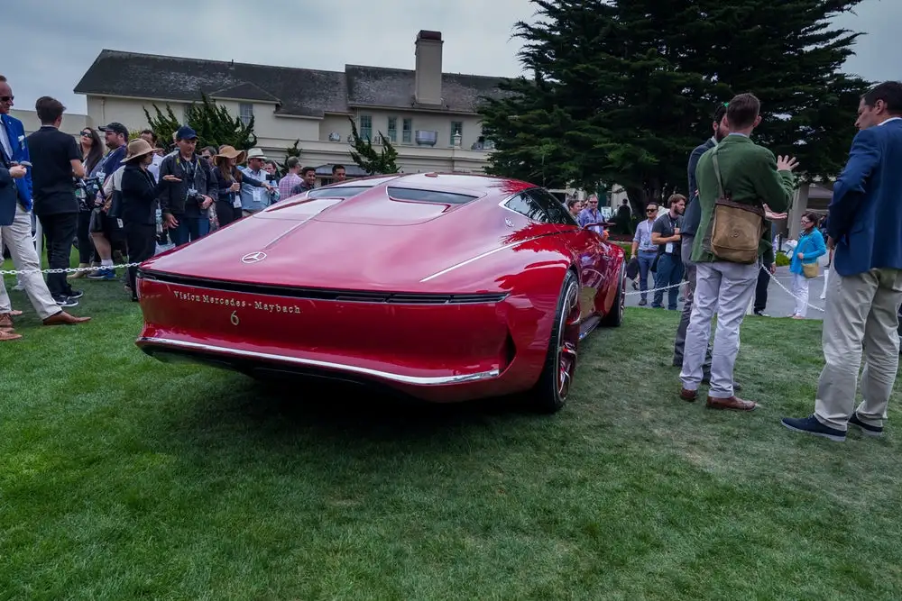 This week's teaser video shows a new, blue car with central trunk area spine much like the one on last year's concept
