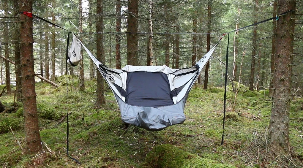 After strapping the hammock up, slide the mattress in and it's ready