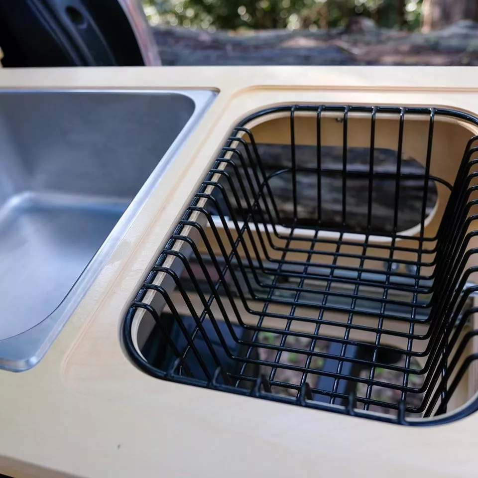 The rinse basket is a nice idea not included on other camp kitchens, providing integrated space for drying (or simply storing) dishes and food