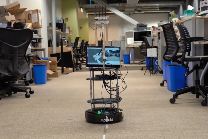 A wheeled robot utilizes the experimental system to determine its whereabouts
