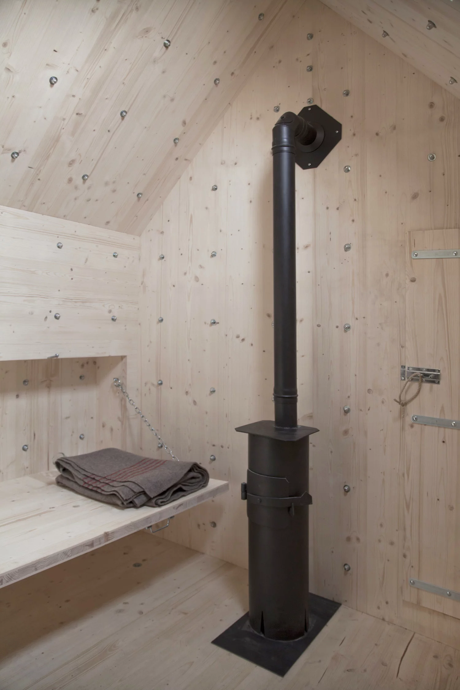 A wood burner provides heating (Photo: Dylan Perrenoud)