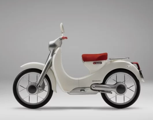 The side view of the EV-Cub electric motorcycle