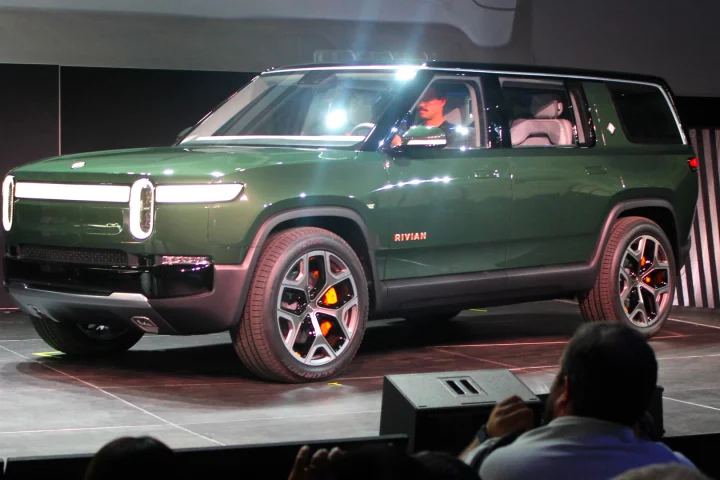 The R1S is a mixture of Land Rover and Jeep with an odd splash of Volkswagen ID conceptuals in its design