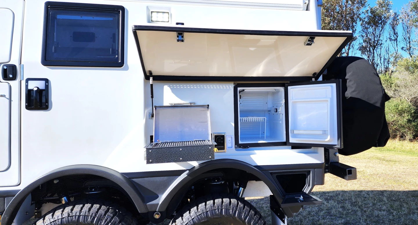 EarthCruiser simplifies the outdoor kitchen with an electric grill and small fridge