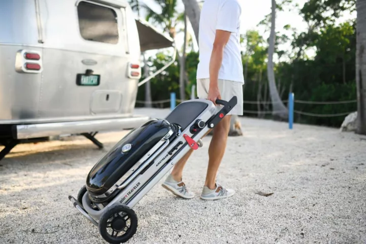 Rubberized wheels help the AuWeber Traveler roll over smooth or rough surfaces alike