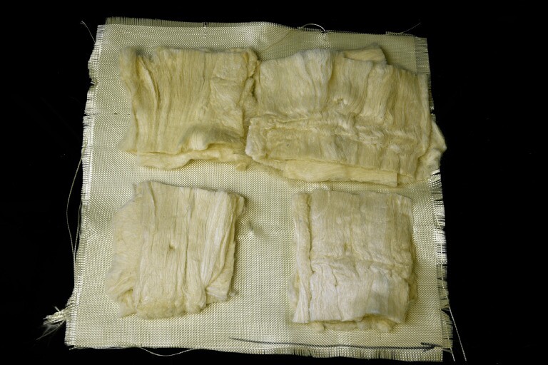 Sheets of Twaron and the new nanofiber material, which performed about the same in ballistics tests