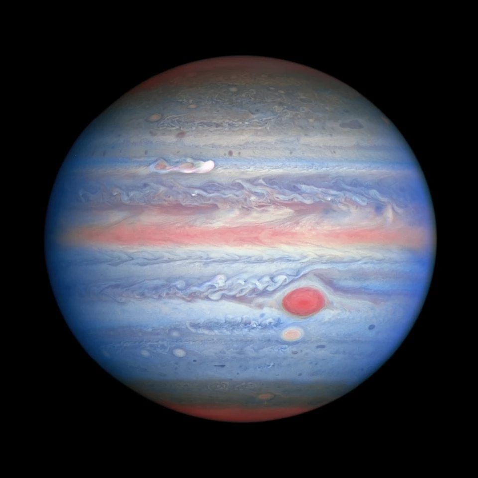Snapped by Hubble on August 25, 2020, this composite image shows Jupiter in visible, ultraviolet and near-infrared light. Blue sections represent UV light being reflected, while the red areas are clouds absorbing UV