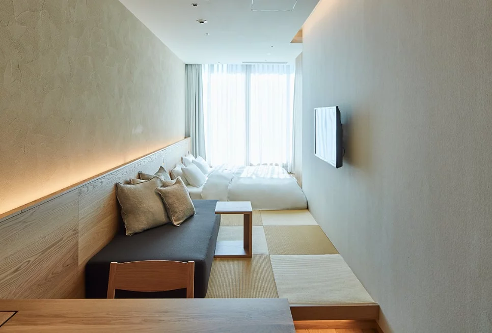 In traditional Japanese style the hotel’s interior design maximizes the use of natural materials such as wood