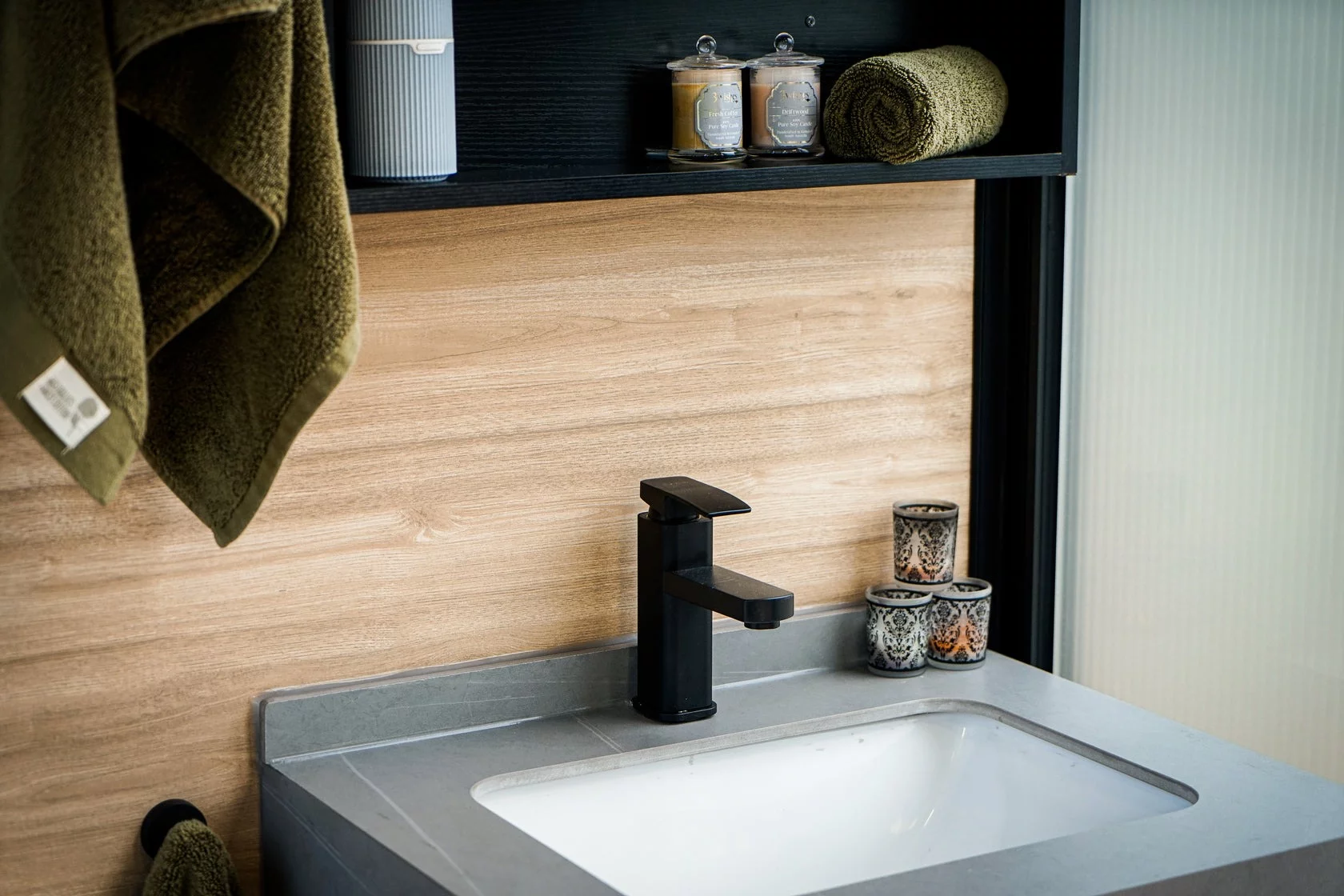 The Beaufort Bushland Retreat's bathroom includes a shower, sink and a toilet