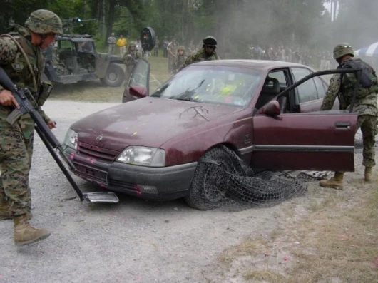 QinetiQ's X-Net vehicle arrest system in use in a military drill.