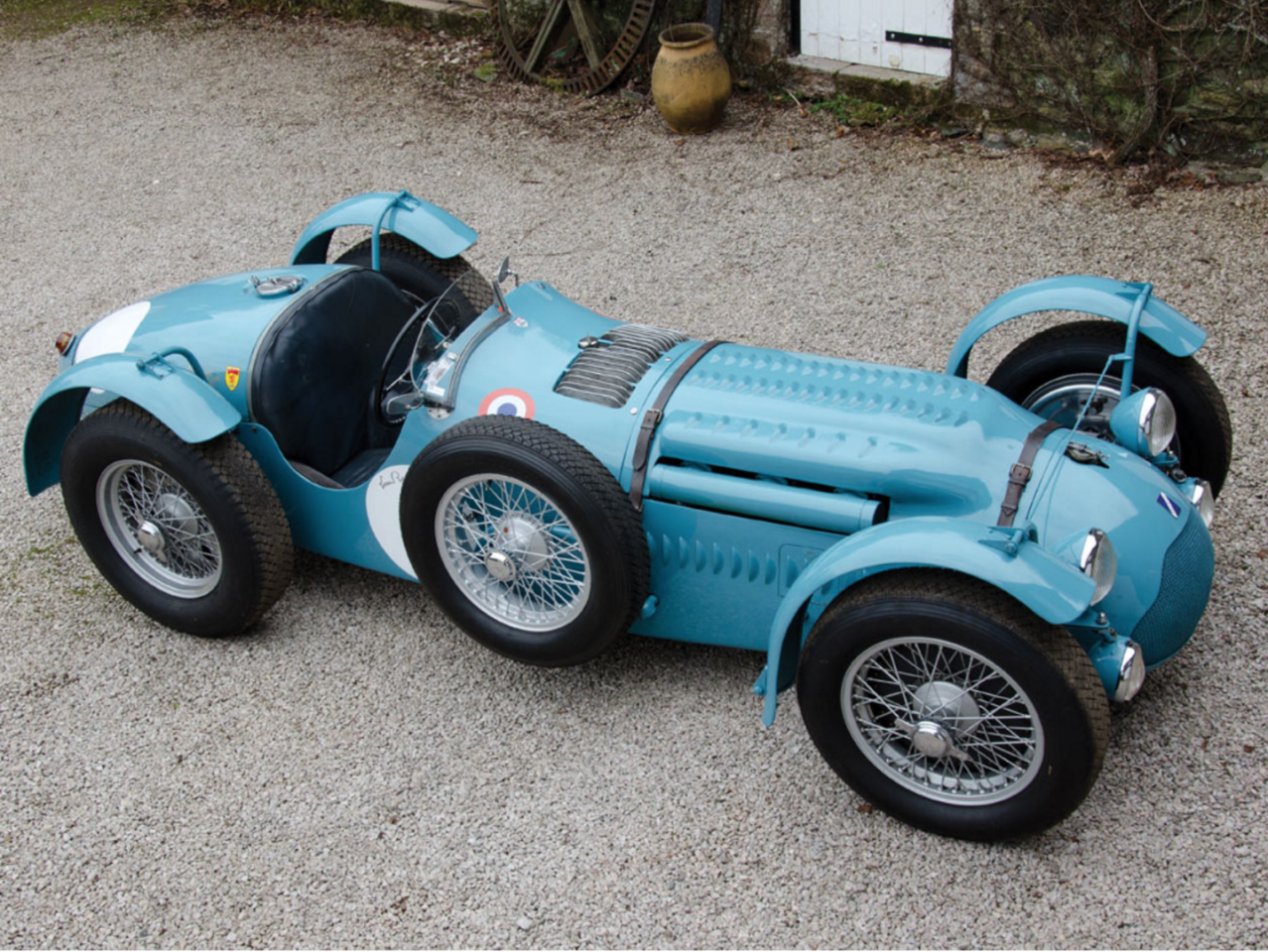 In the immediate post-war races, there were clearly faster road cars than the Healey Elliot that weren't being officially timed, with the Alfa Romeo 6C 2500 Super Sport, Delage D6S-3L, Delahaye 135CS and Talbot Lago T26 Grand Sport the most obvious. All three of these cars featured in the results of the Le Mans 24 hour races when it reconvened from 1949 onwards, with the Talbot Lago T26 Record four-door saloon of 1946 claimed to be capable of 105 mph (169 km/h) with the Grand Sport above claiming a 124 mph (200 km/h) top speed. A T26-based open wheeler won two major Grands Prix in 1949, then took outright first place in the 1950 Le Mans 24 hour race, finishing second in the world's most important race again in 1951 (car pictured above).
