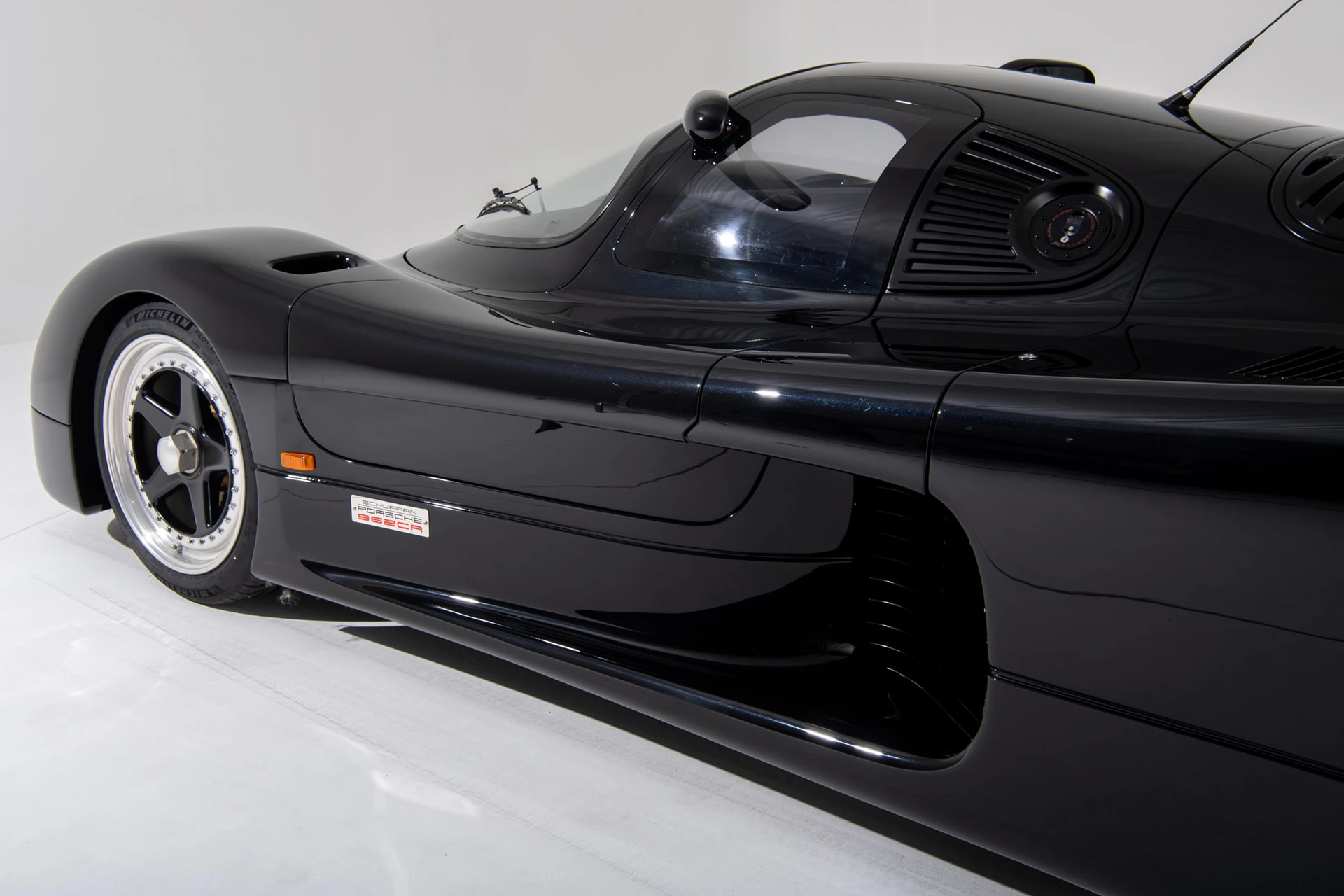 The Schuppan 962CR (Chassis # AS 962CR P2) that is currently for sale is the second prototype and was the first car to be built on the two-inch-wider Reynard carbon fiber chassis. The extra two inches were added to allow for slightly more cabin room and only four of these chassis were ever produced.