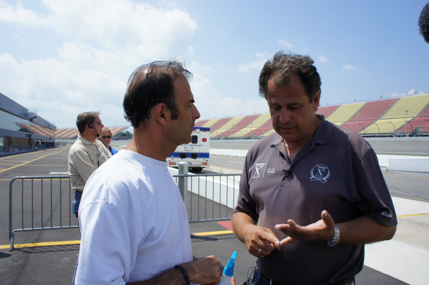 Edison 2 founder Oliver Kuttner congratulates Very Light Car Driver and five time Le Mans winner Emanuele Pirro after successful completion of the 200 mile range test