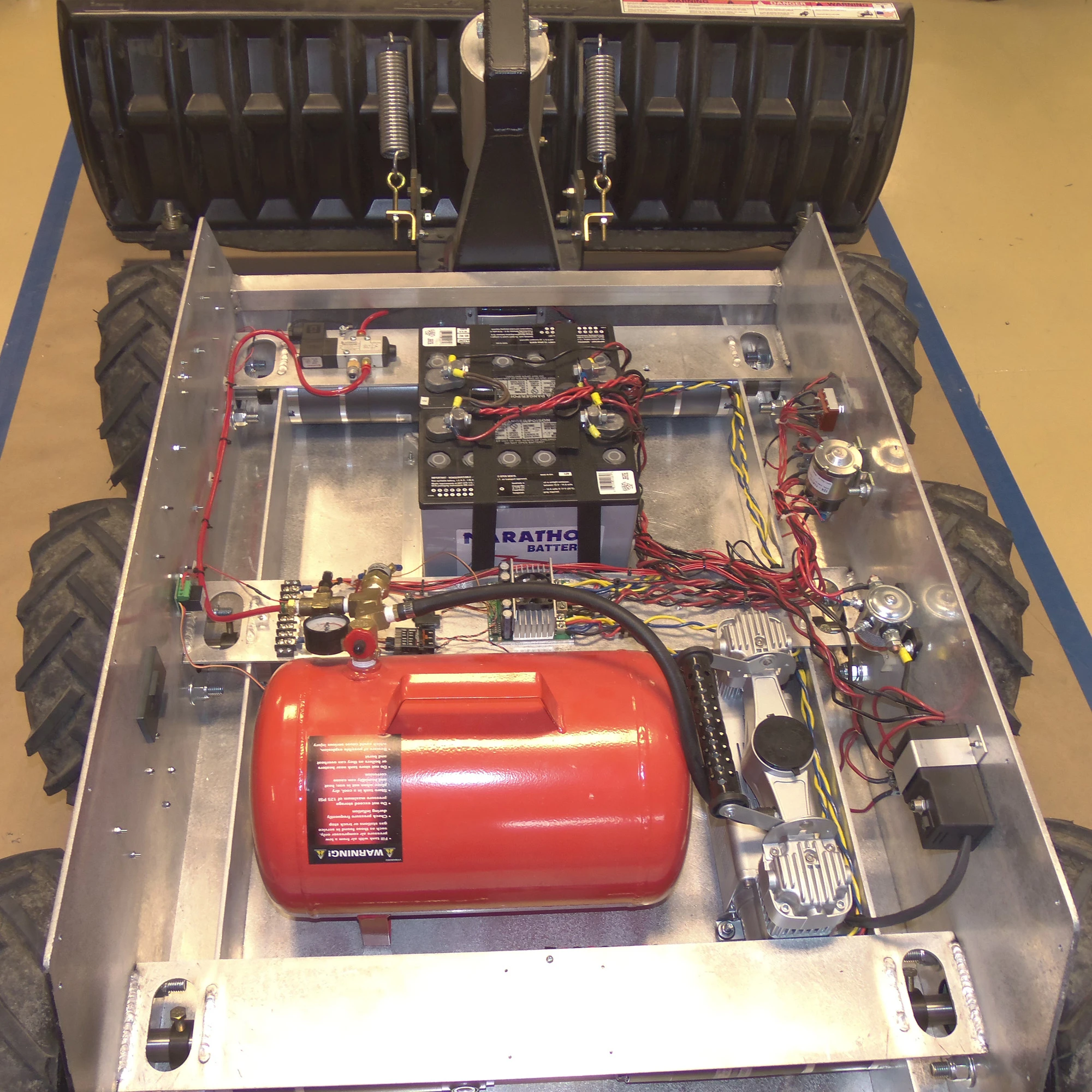The SuperDroid snow plow's workings