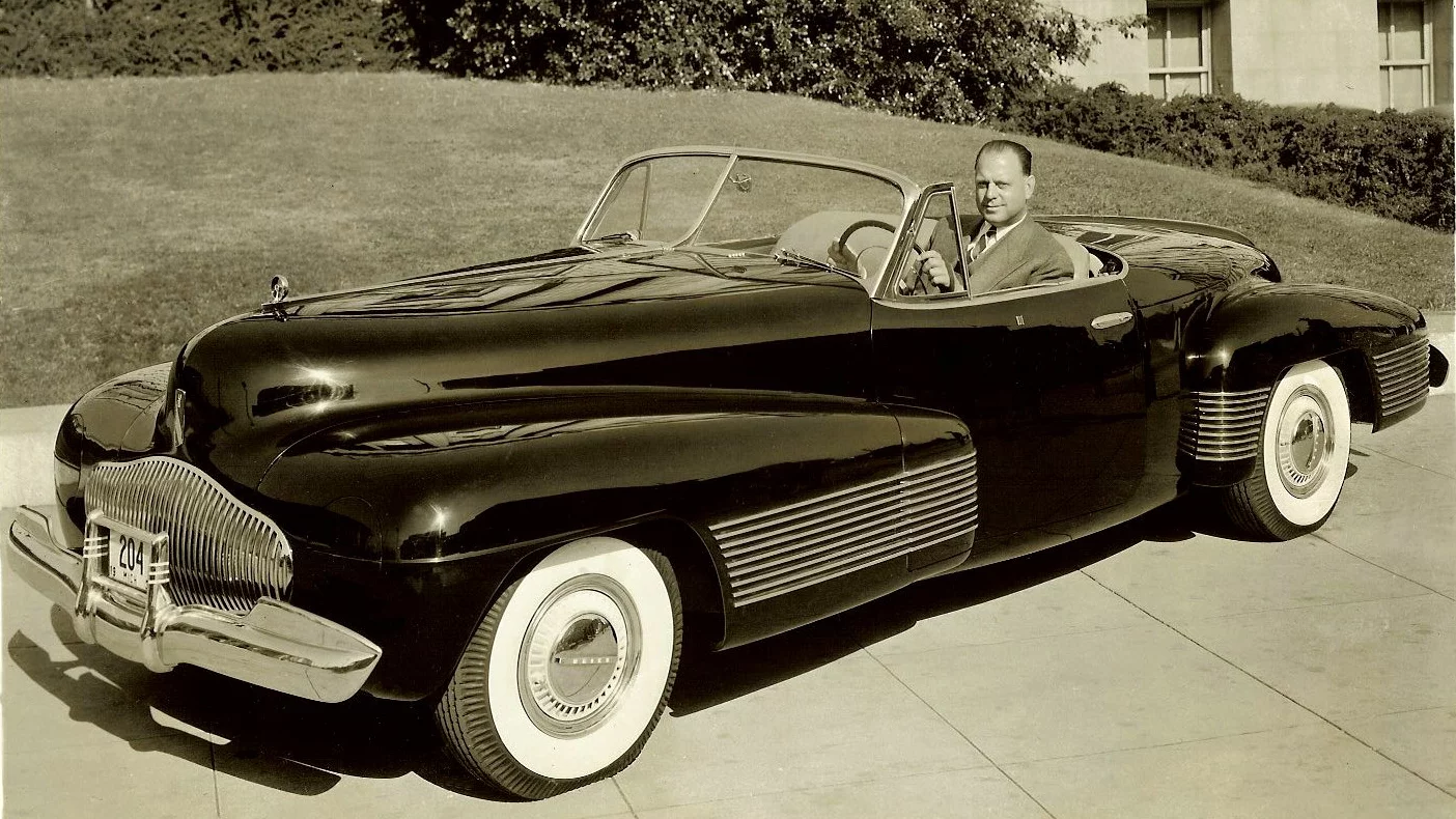 Harley Earl and the Buick Y-Job of 1938, the first American-made concept car. The Buick Y-Job designed by Harley Earl in 1938 is often claimed to be the world's first concept car, though Rolls-Royce had been building fully functioning "experimental vehicles" since 1919, when the first such vehicle (1EX) was constructed, predating the Y-Job by almost two decades. The Buick Y-Job (pictured) did however, get the ball rolling in America, and one of the direct consequences of Harley Earl's rolling art deco masterpiece was the 1941 Chrysler Thunderbolt concept car that was exhibited from the Richard H Driehaus Collection at Amelia Island.