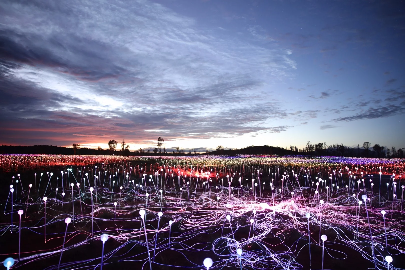 Field of Light makes the otherwise dark 49,000-sq m (527,000-sq ft) area on which it is installed awash with color