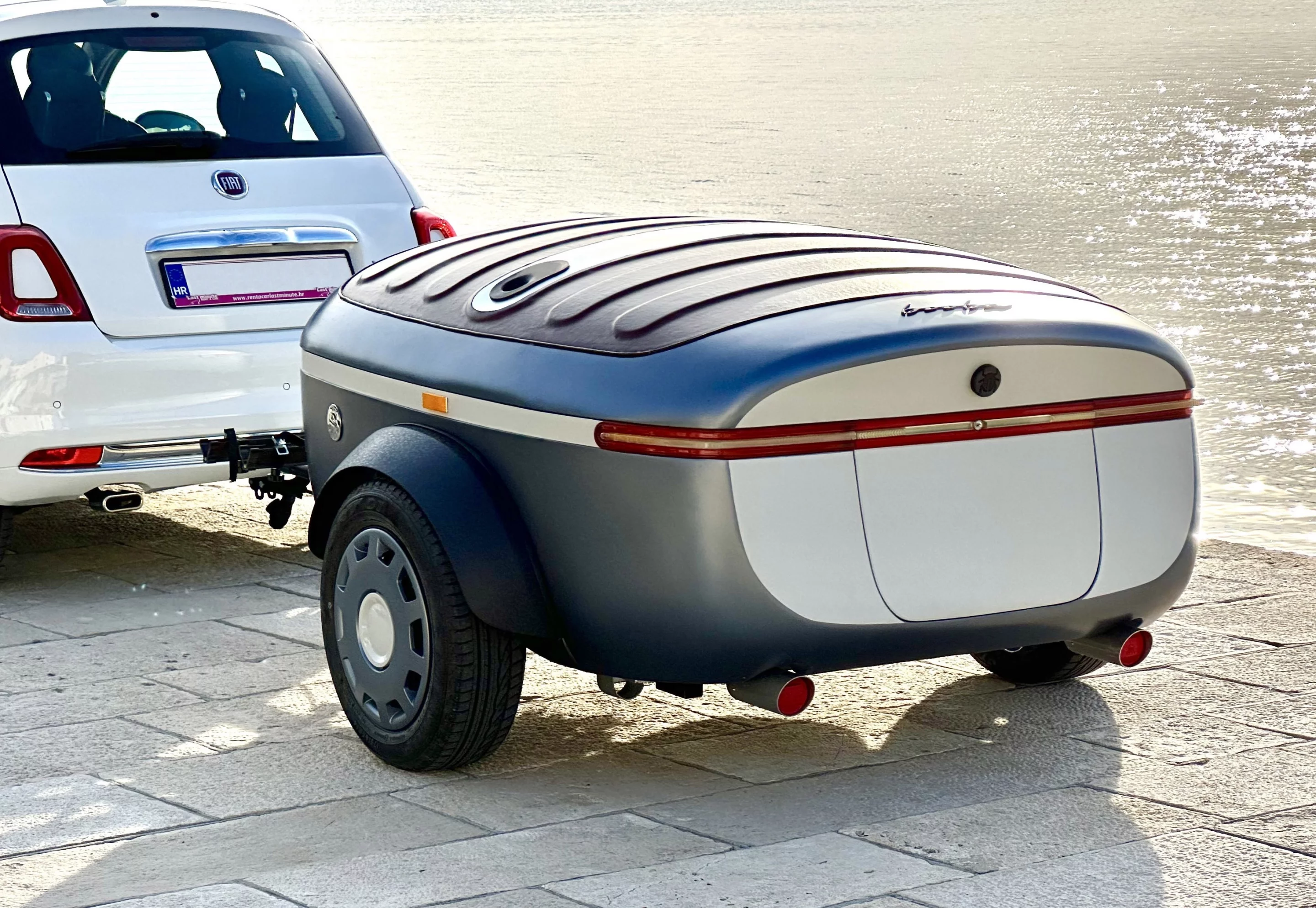 At 530 lb to start, the Urbanoid Booba is designed to be towed by the smallest cars, including this Fiat 500