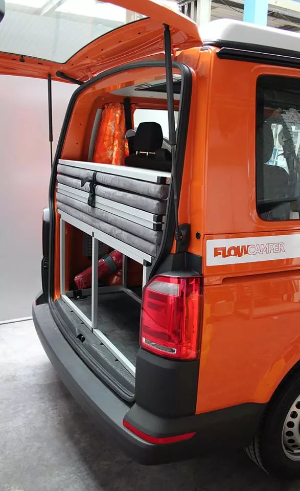 The folding bed fits in back