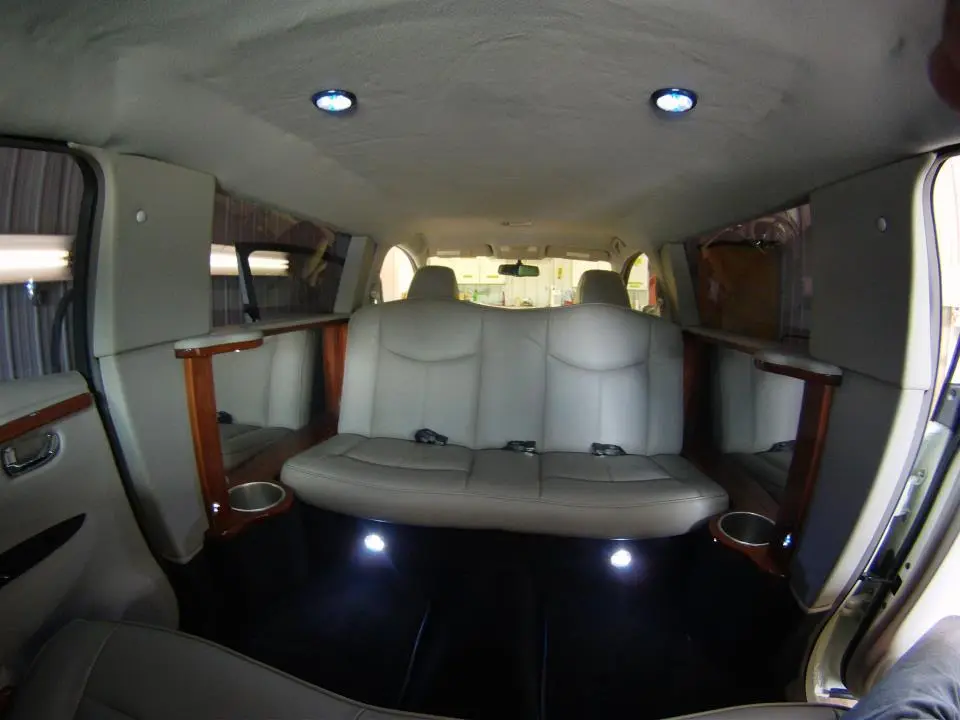 The interior of the Leaf limo features leather upholstery and cedar paneling (Photo: Imperial LimoLand)