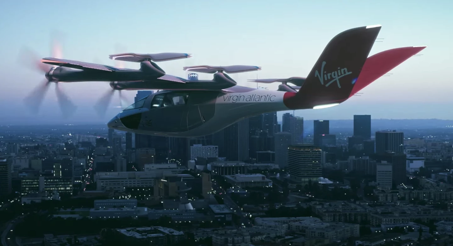 Rear props scissor and sandwich themselves into a low-drag cruise configuration