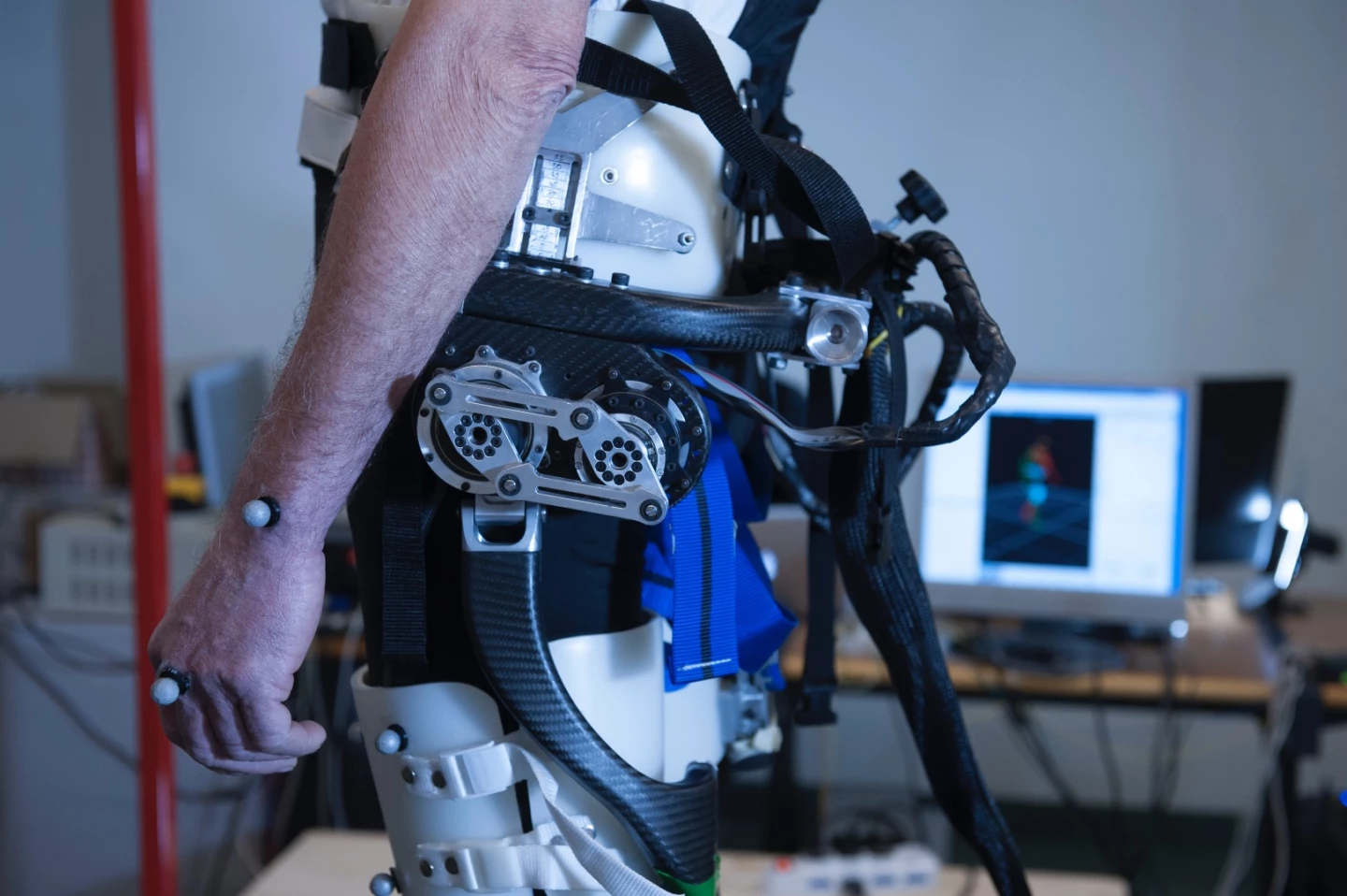 A close up revealing the currently bulky mechanics of the exoskeleton