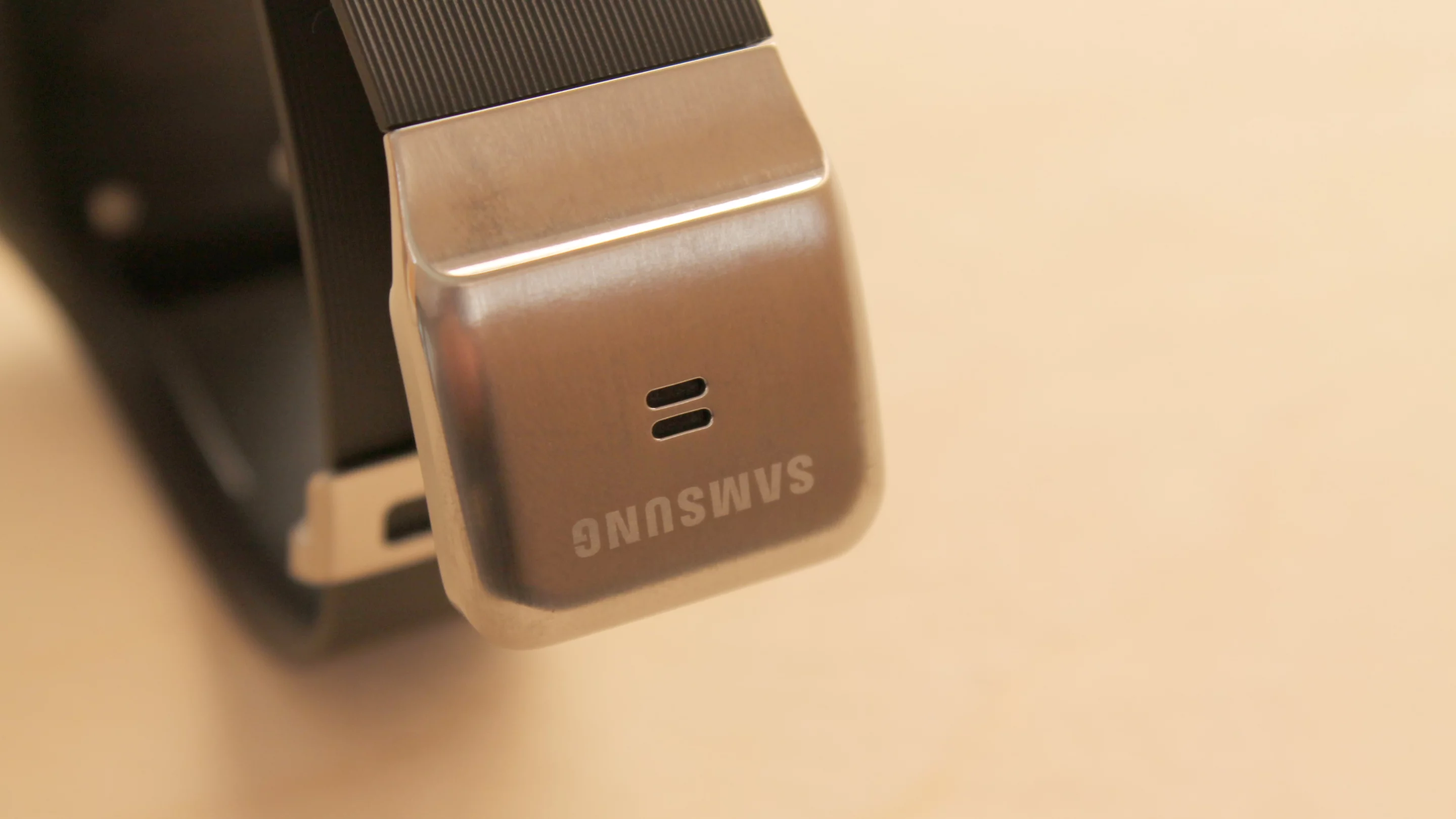 The Gear's speaker and microphone sit on its clasp