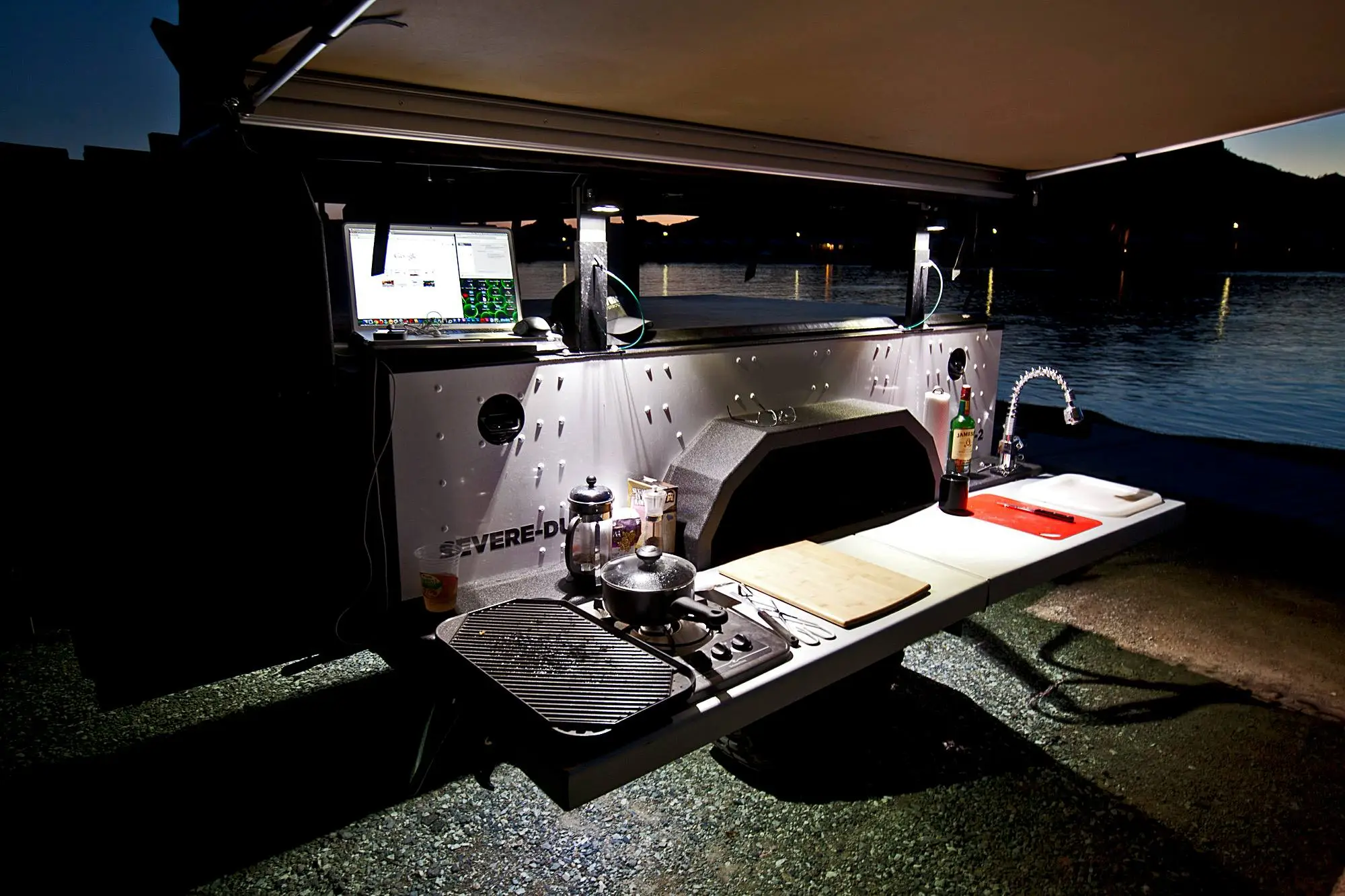 Options include a folding, full-length counter, sink and propane cooktop