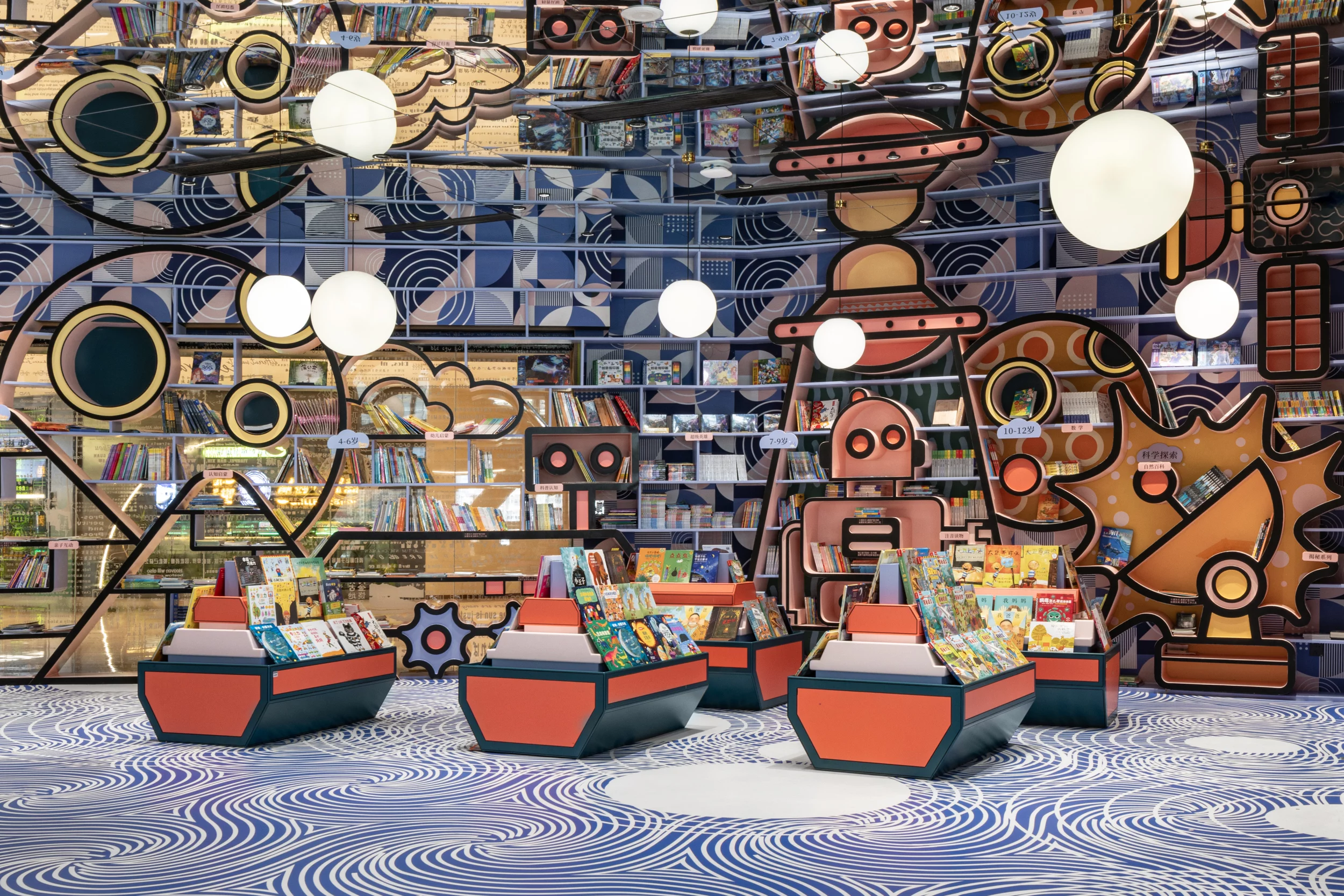 The Huai'an Zhongshuge bookstore includes a children's reading area with a colorful display depicting a robot and satellite