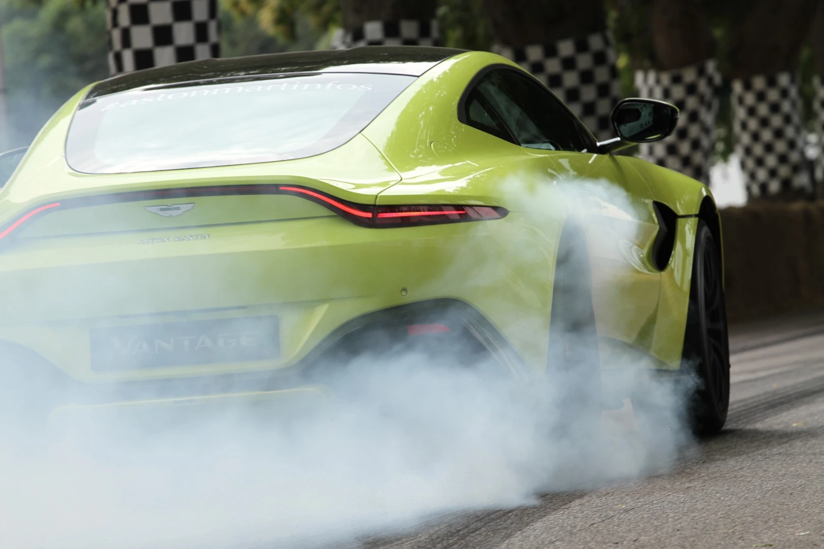 Aston Martin Vantage burns some rubber at the 2018 Goodwood Festival of Speed
