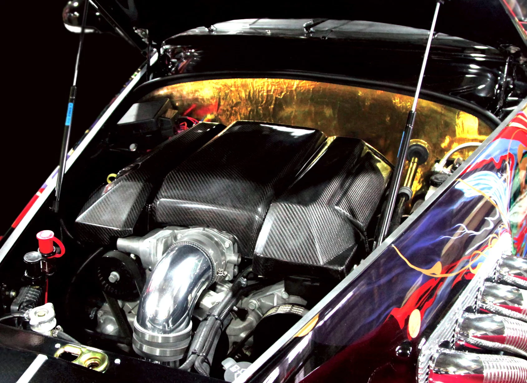 A peak beneath the hood – note the optional 24-karat gold covering on the firewall