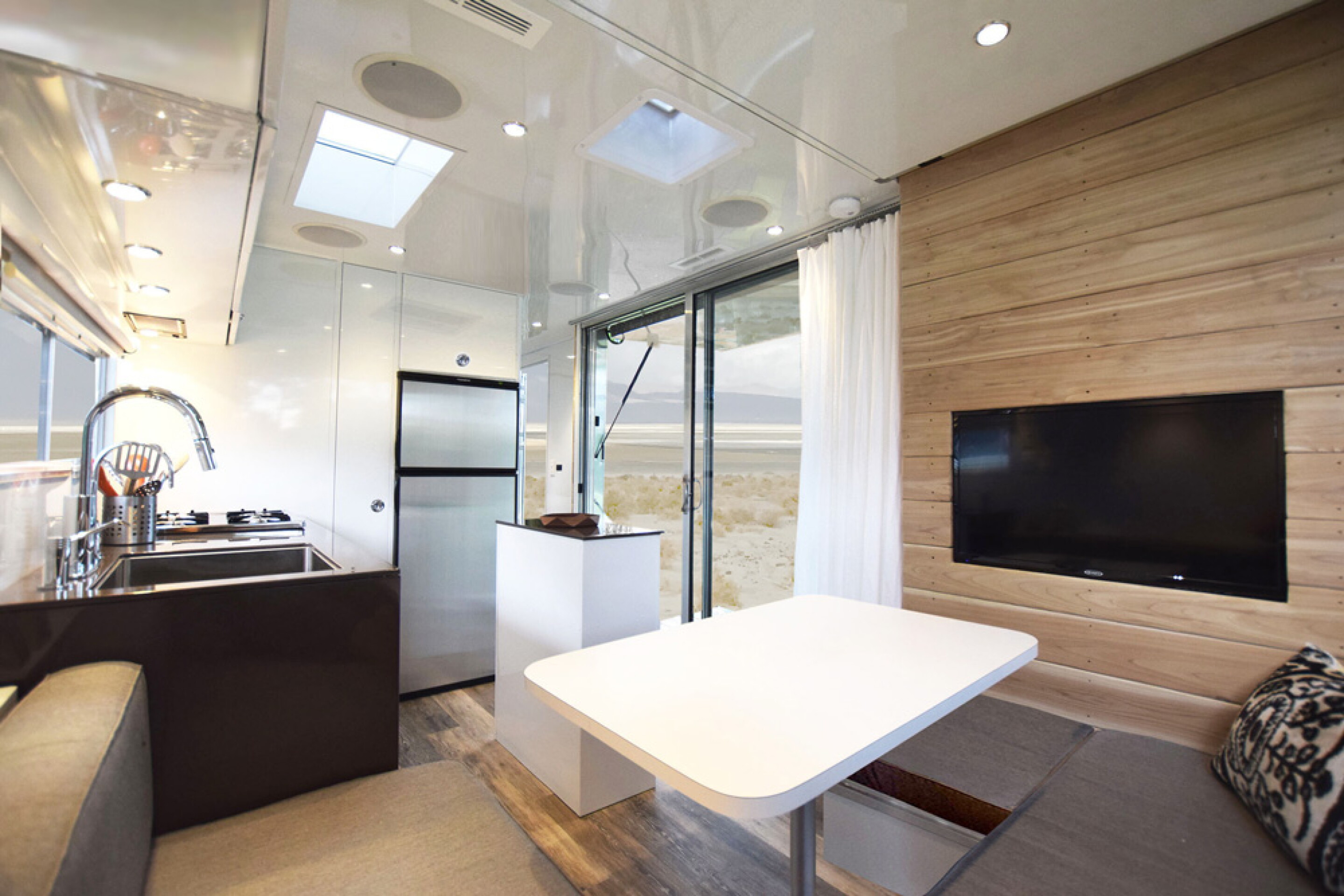 Aluminum-shelled mobile home built for full-time off-grid living - Small Penthouse Off Grid Mobile Home