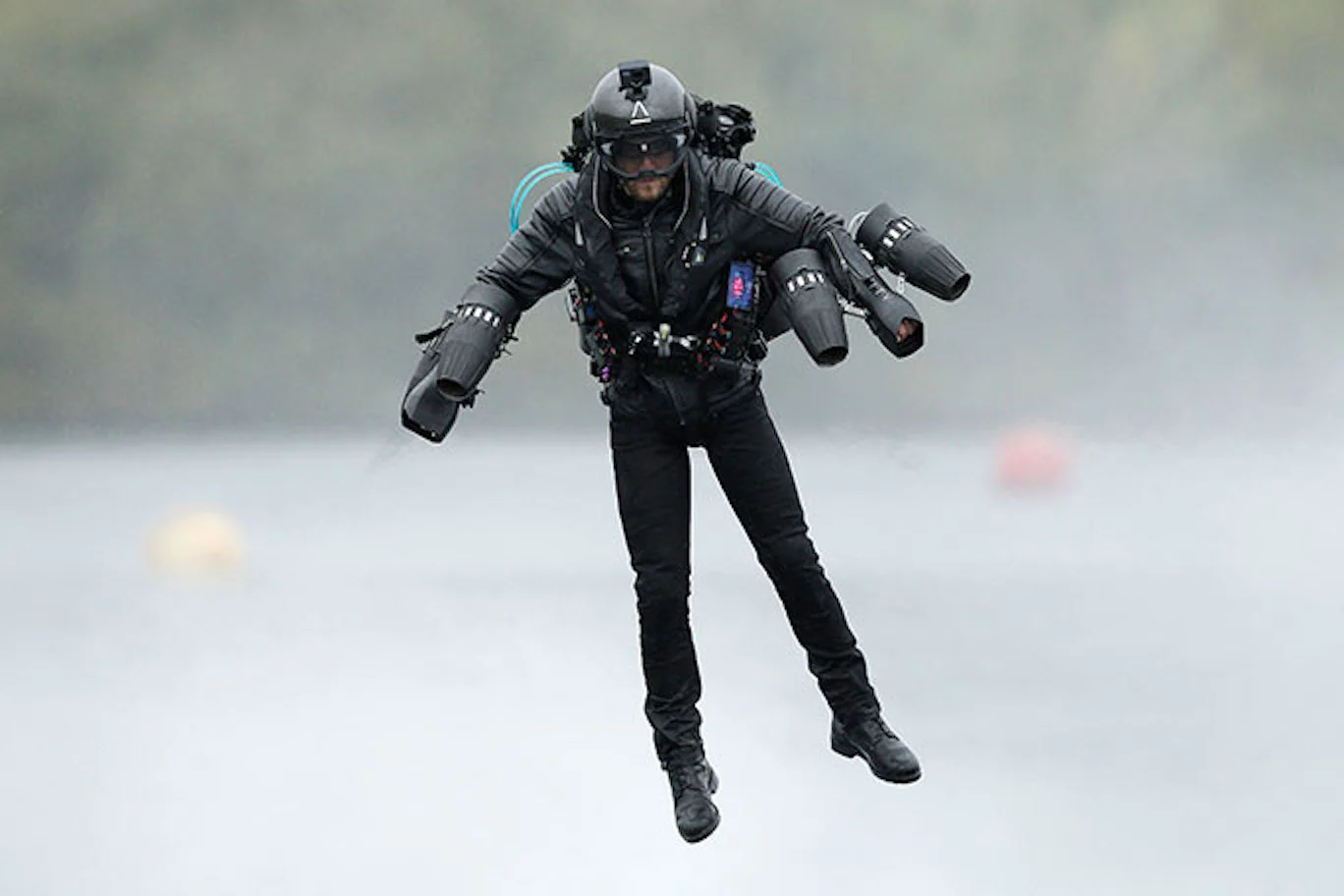 Richard Browning wrestles the Daedalus flight suit in a world record attempt