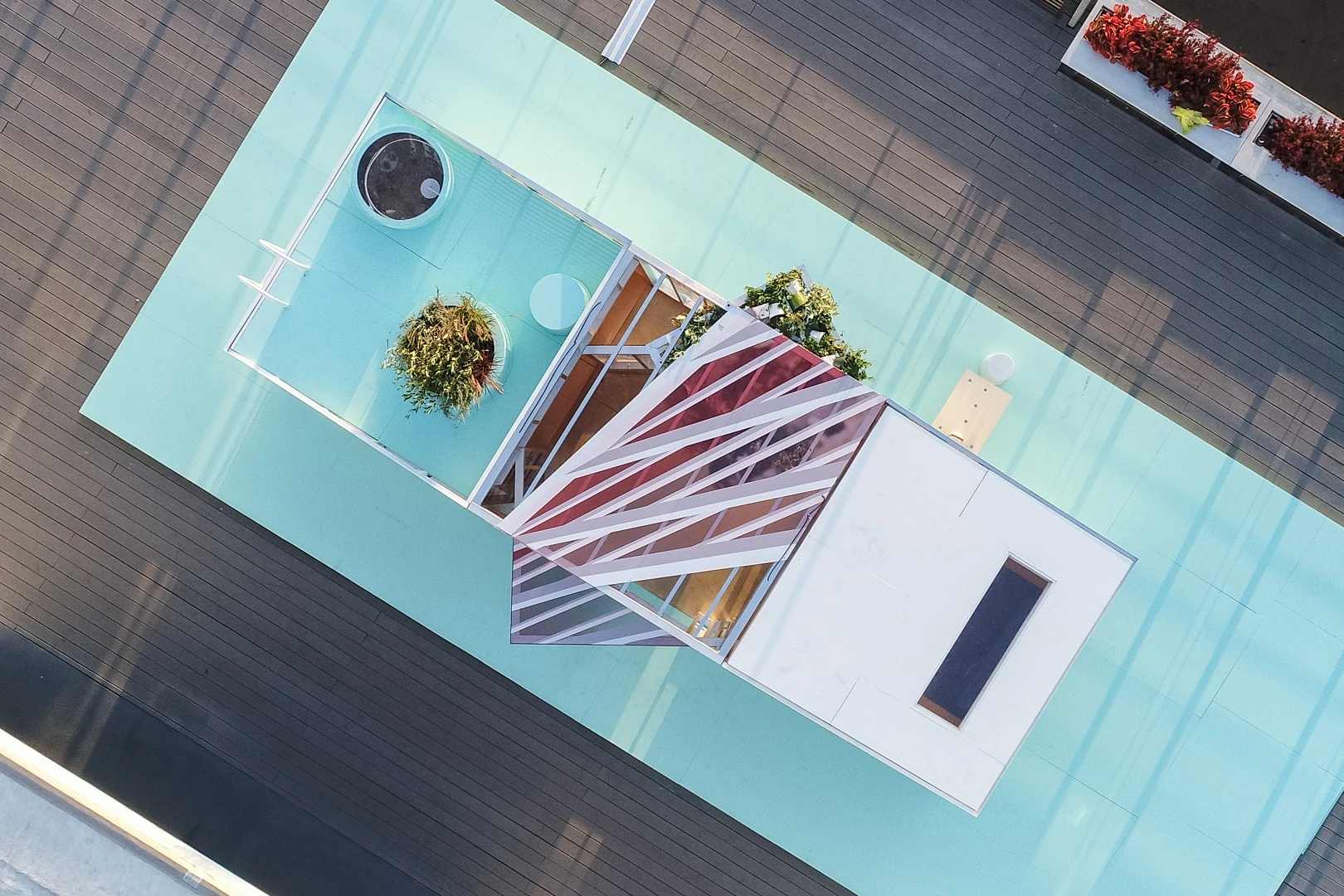 Space-saving mechanisms like folding dining tables and shelves and rotating panels feature throughout the Mini Living Urban Cabin in LA