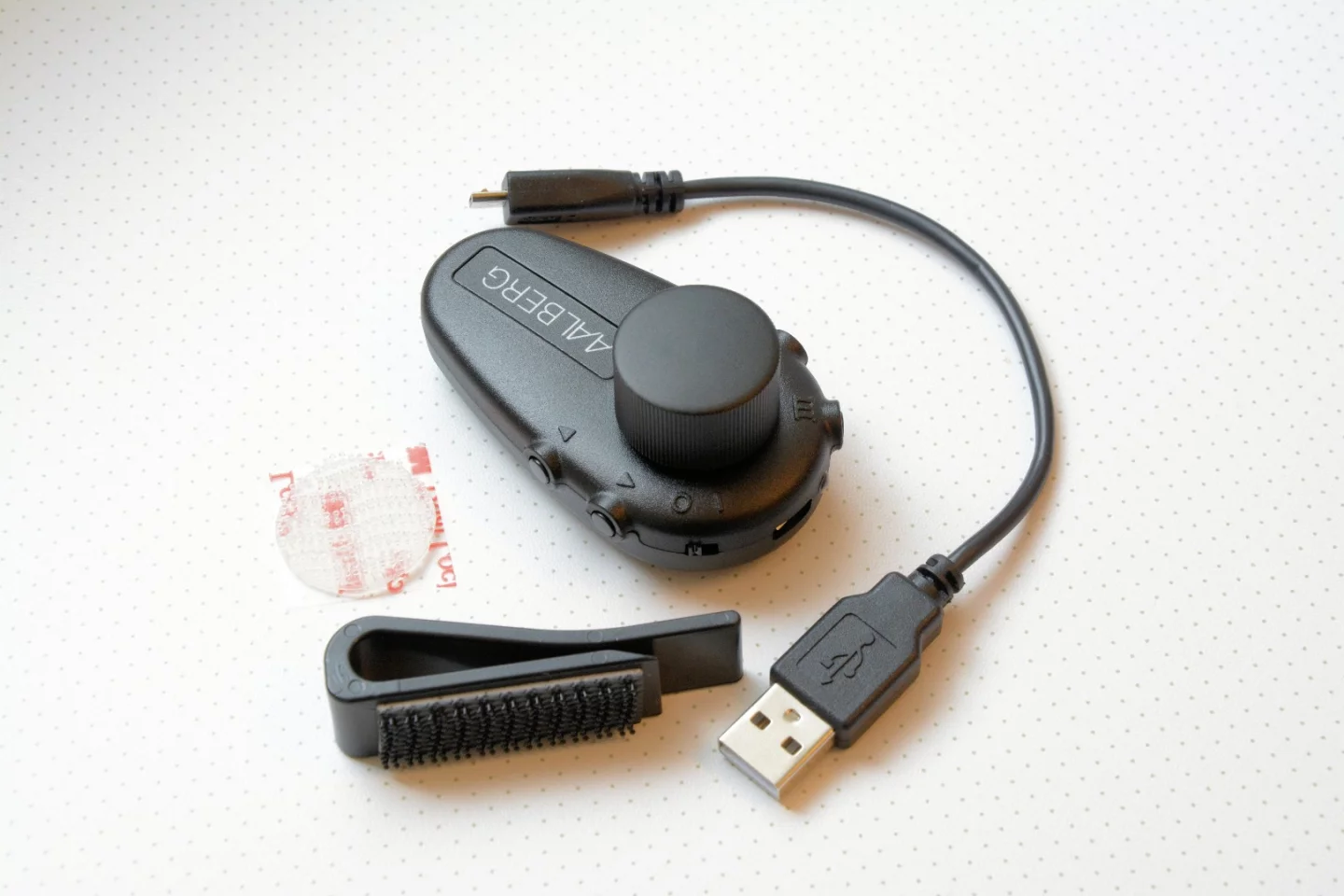 The Aero controller also comes with a belt/strap clip and USB charging cable