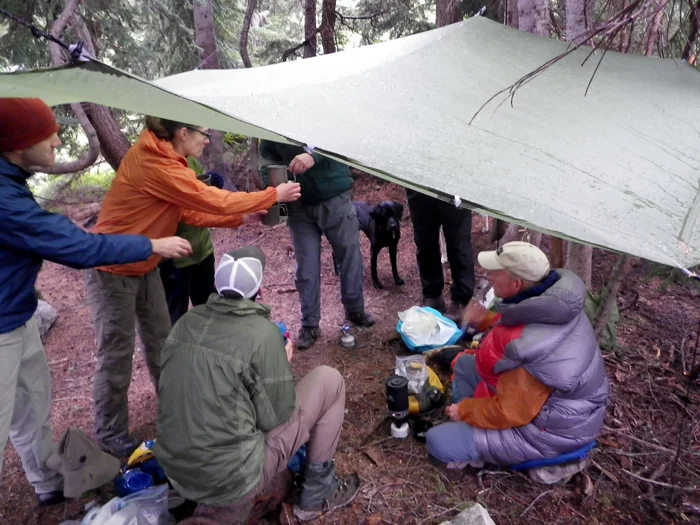 The tarp is oversized, so it can serve as a quick escape from rain and sun