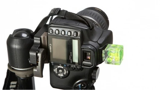Camera cube level provides three-axis bubble levels