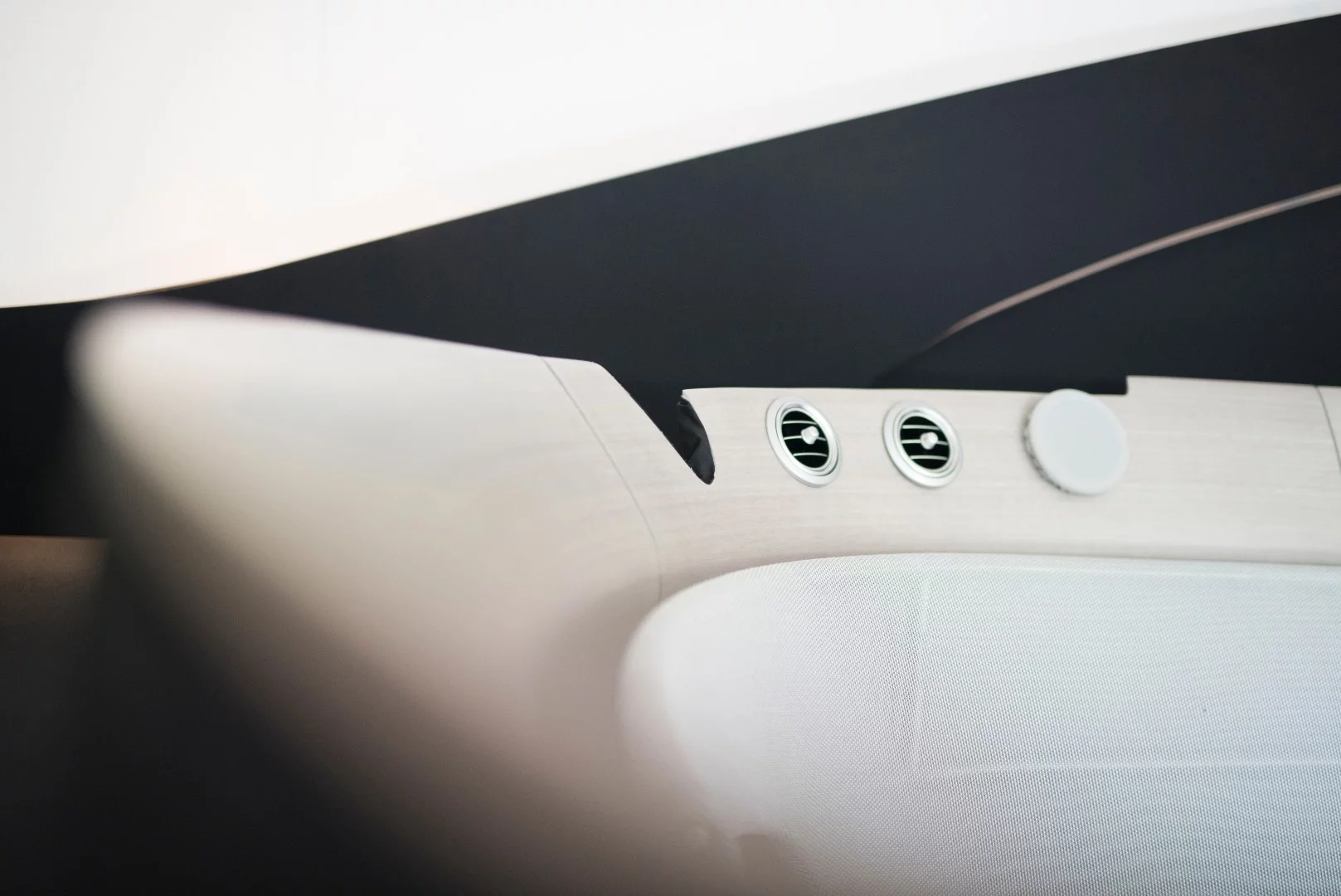 The boat's interior is trimmed in high quality wood and leather
