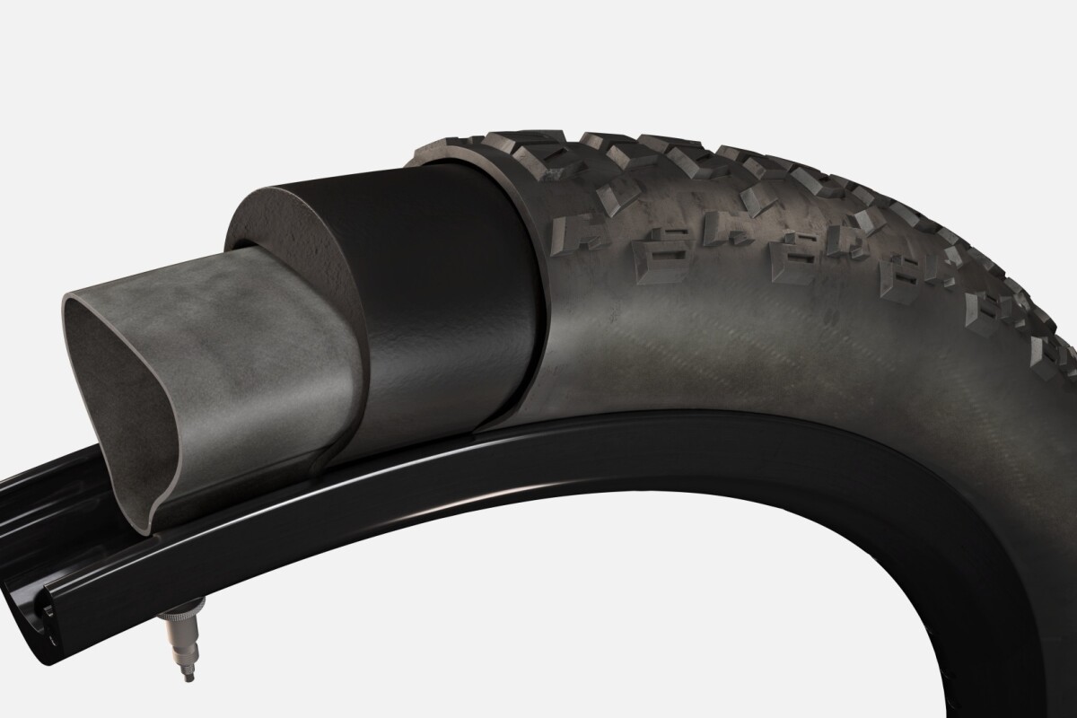 The Tannus Armour insert goes between the existing tube and inner wall of the tire